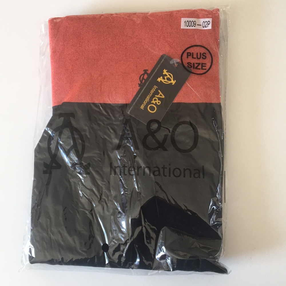 Black leggings with orange top